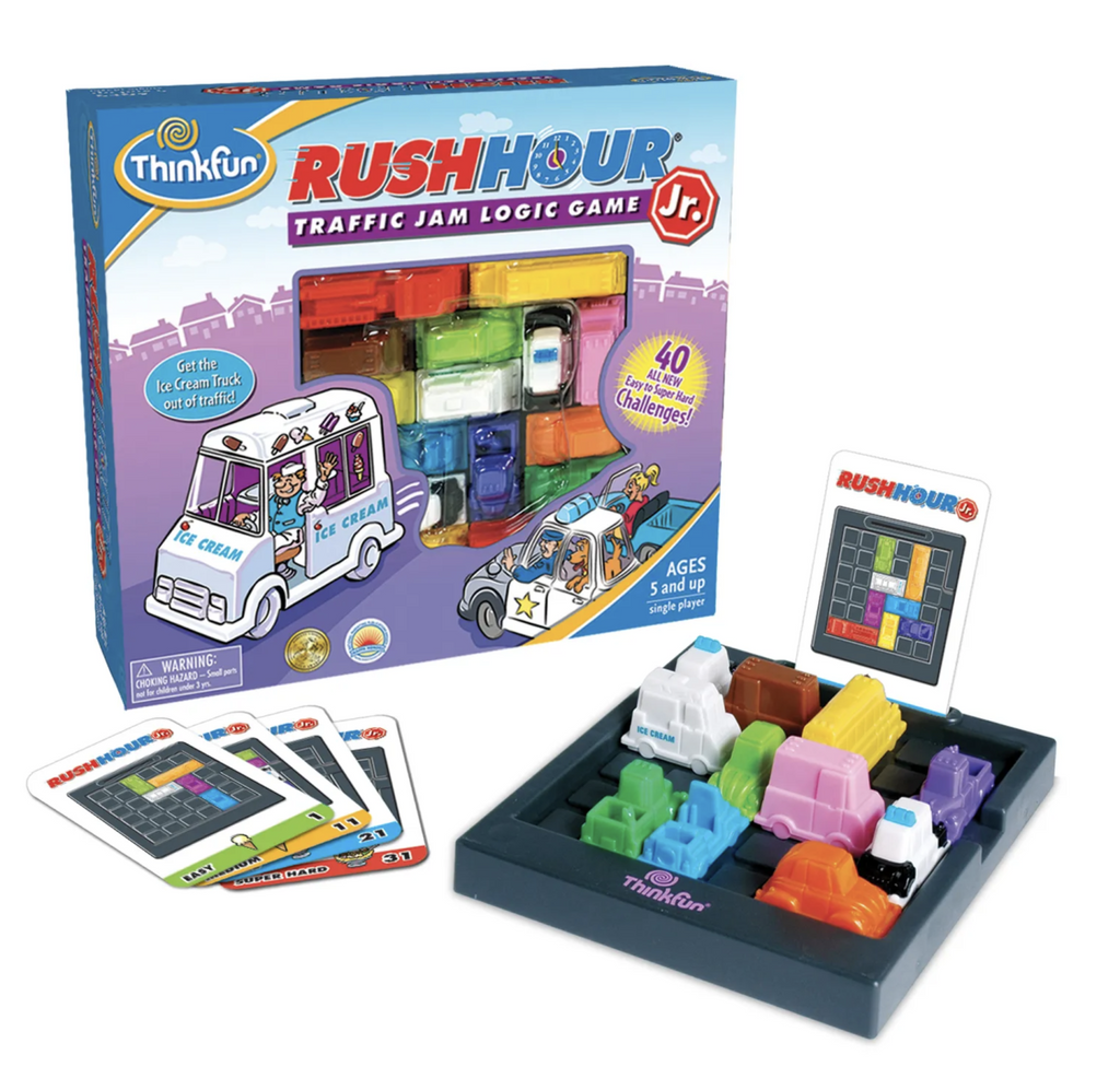 Rush Hour Jr. game box with game board with cars and various challenge cards.