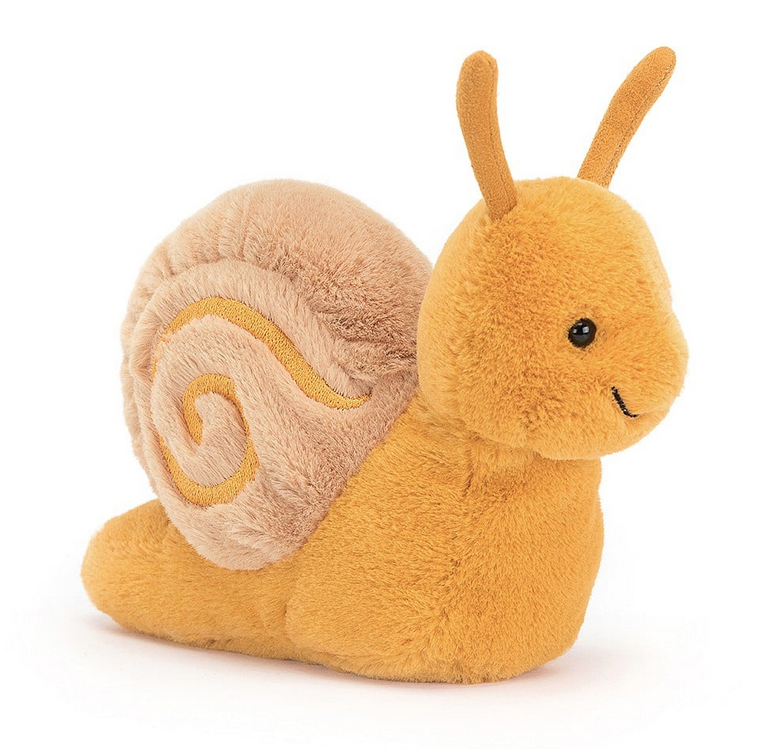 Sandy Snail viewed from a slight right angle showing off her golden yellow fur and light brown swirled shell. 