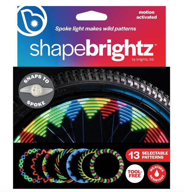 Box of ShapeBrightz. Spoke light makes wild patterns. Snaps to spoke. 13 selectible patterns. Tool free. Weather resistant. Motion activated.