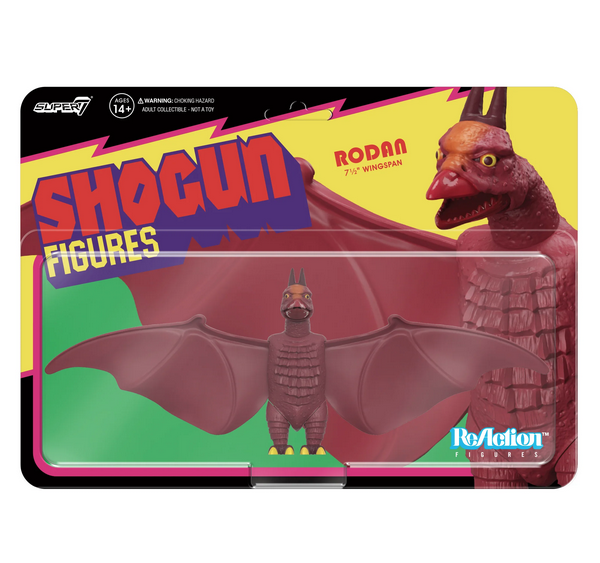 Shogun Rodan figure in a box with a clear plastic window. The background of the box has a picture of Rodan with red, green and yellow.