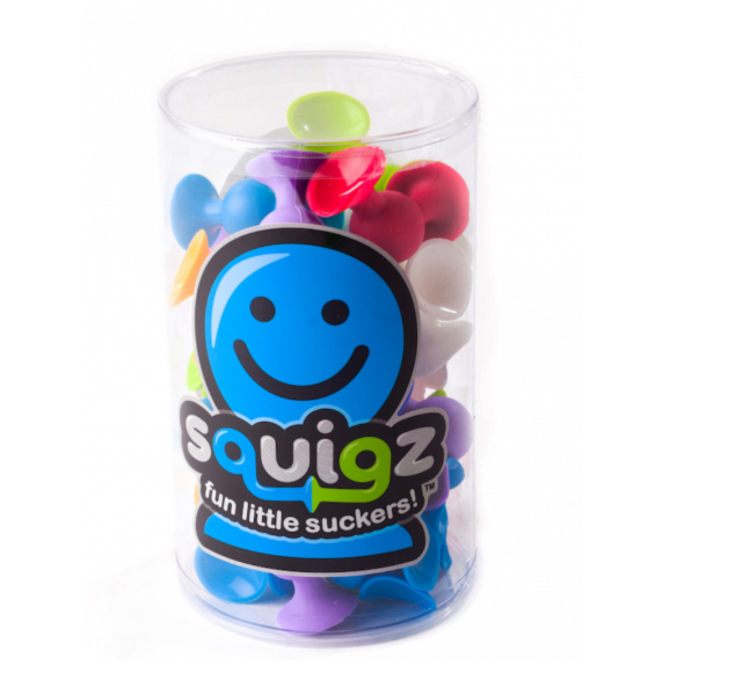 Package of Squigz silicone toys. Toys come in various shapes and colors with suction cups on each end. Package reads Squigz fun little suckers.