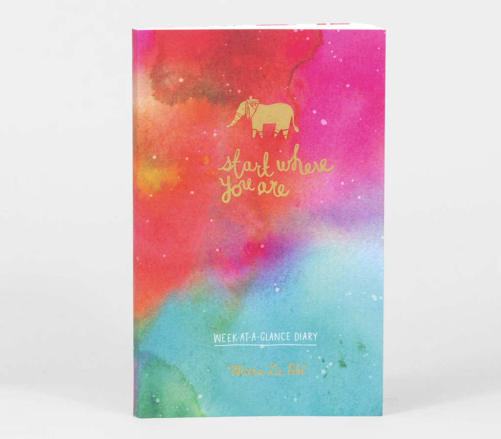 Cover of the Start Where You Are diary with swirling colors of red, pink, green and blue. 