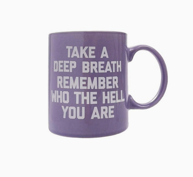 Purple ceramic mug with white letters that read " take a deep breath remember who the hell you are"