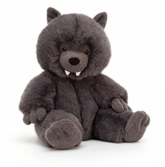 Wilf Wolf plush with mocha paws, snub snoot and ears and a beautiful black bobble nose. He does have fangs but they're suedey-soft, just like his yummy charcoal tummy!