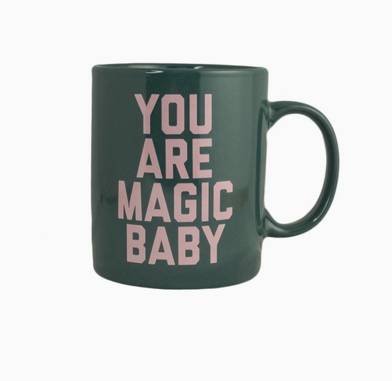 Greem mug with pink letters that read " You are magic baby"