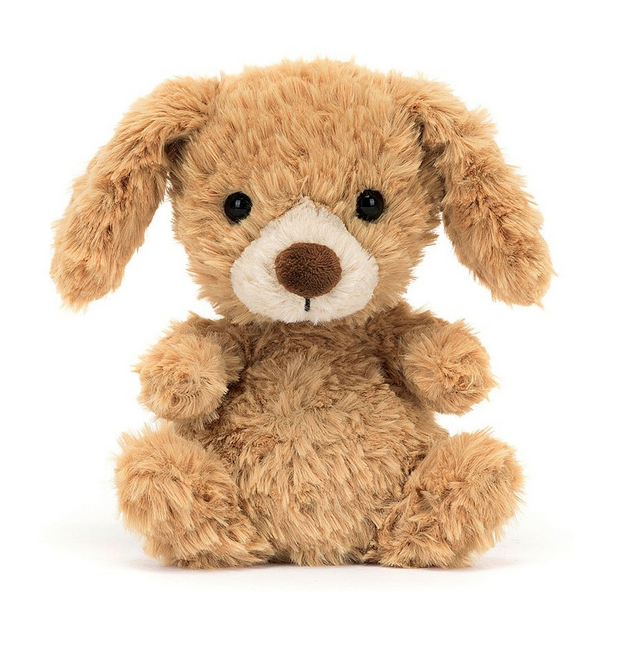 Close up view of little Yummy Puppy plush. It's sitting up with the sweetest face and toffee brown fur. It's arms are open as if waiting for a hug. 