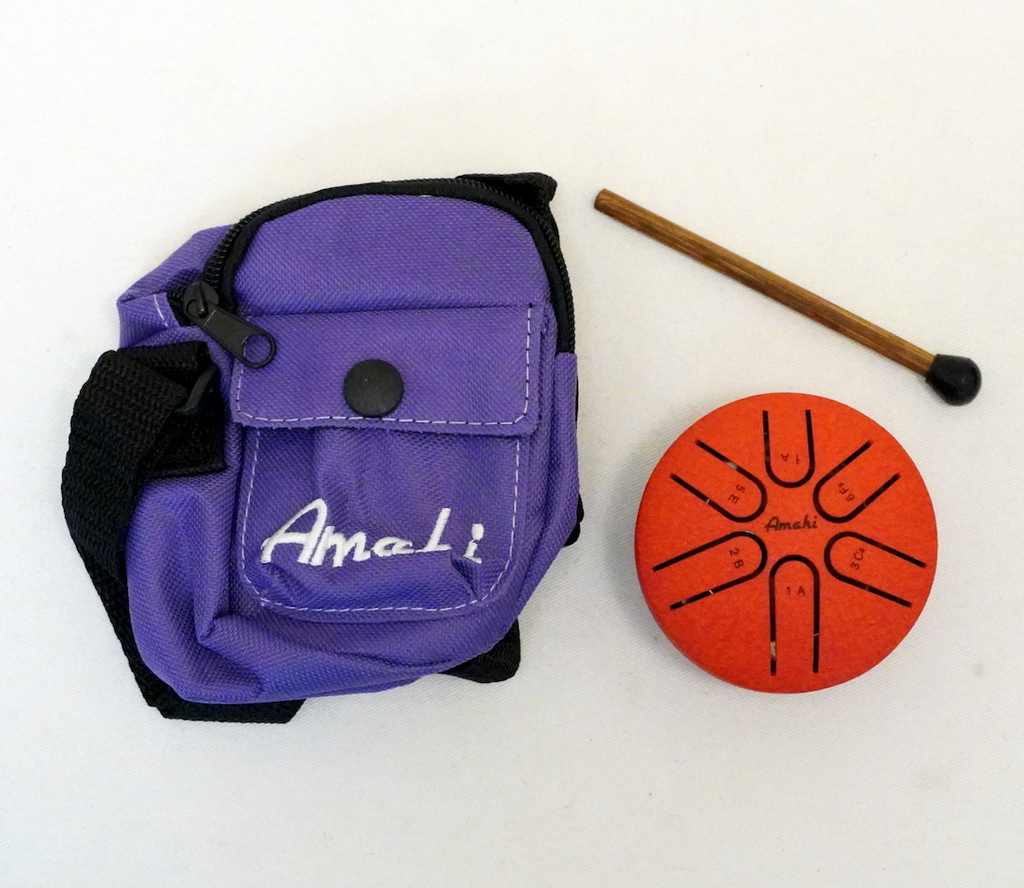 The Amahi 3" Red Steel Tongue Drum with gig bag and mallet. 