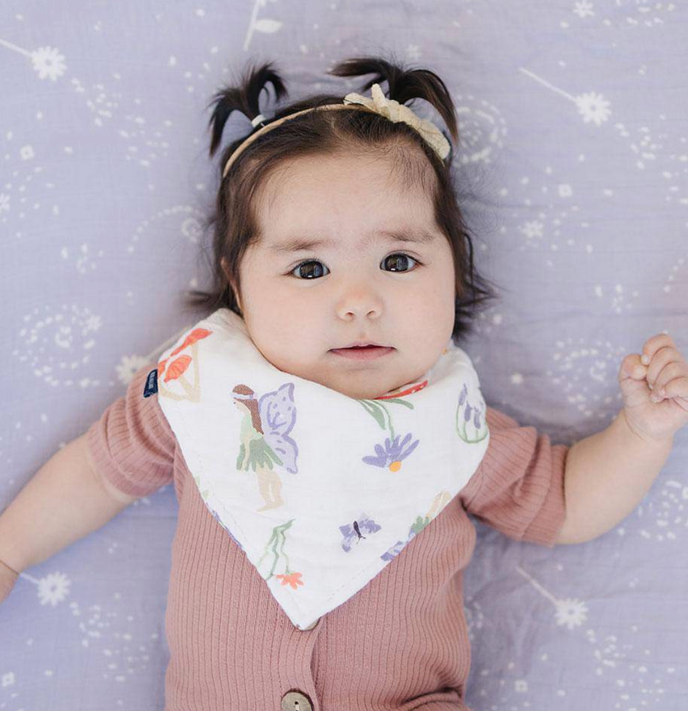 A sweet baby wearing the muslin bandana woodland fairy bib.