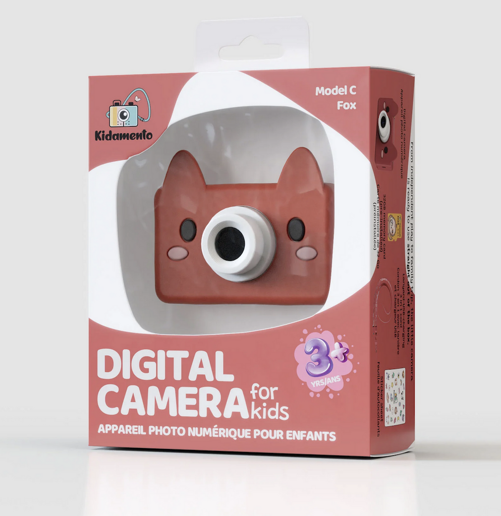 Akito the Fox Model C Digital Camera packaged in a red box with a clear window to show the red camera with a fox face. 