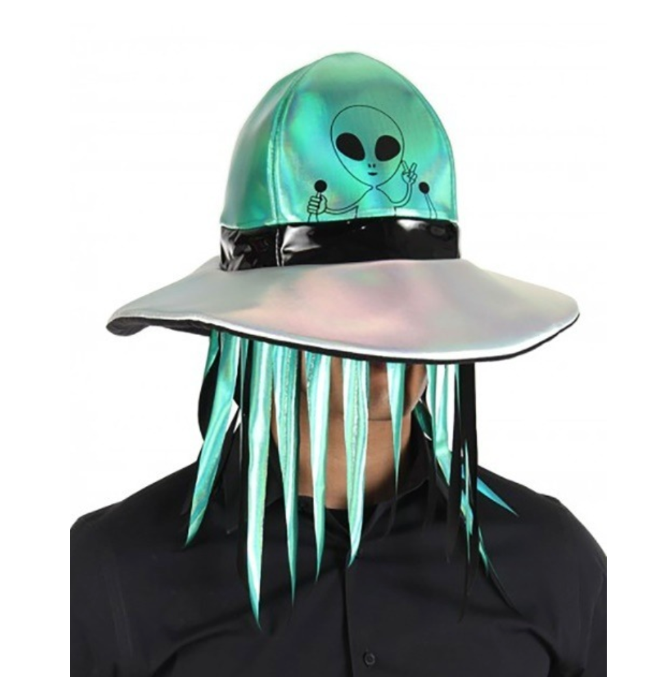 The Alien Abduction Hat has printed graphics on the front of an alien steering a spaceship hovering above your head. Made from 100% polyester with a silver and green metallic-looking sheen. Here it is being worn by an adult. 