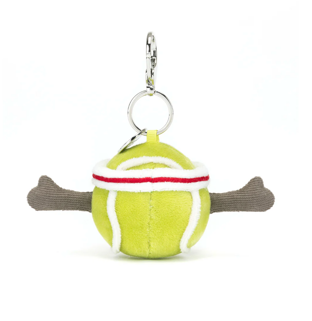 Back view of the plush tennis ball bag charm with silver clip.
