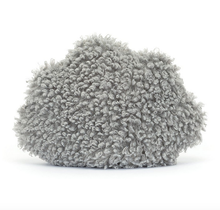 View of the back of the Amuseable Storm plush cloud. A cloud shape with curly, fuzzy fur covering it. 