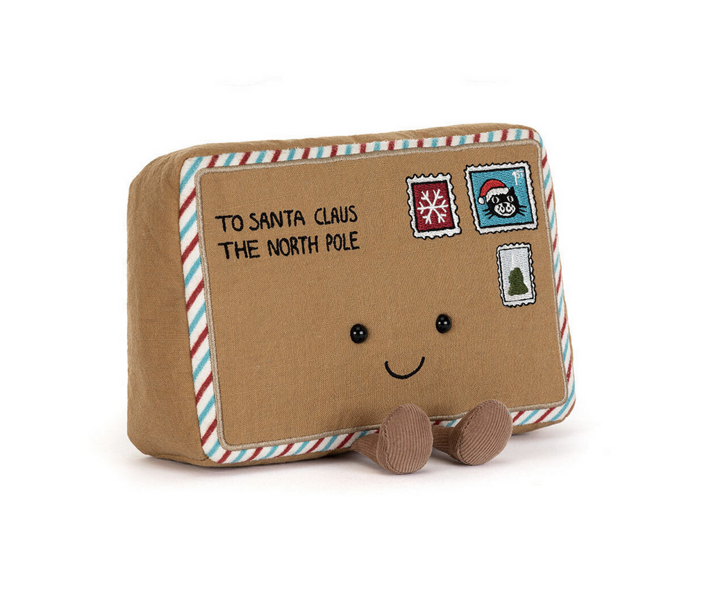 Plush toy brown letter to santa with a happy face on a white background