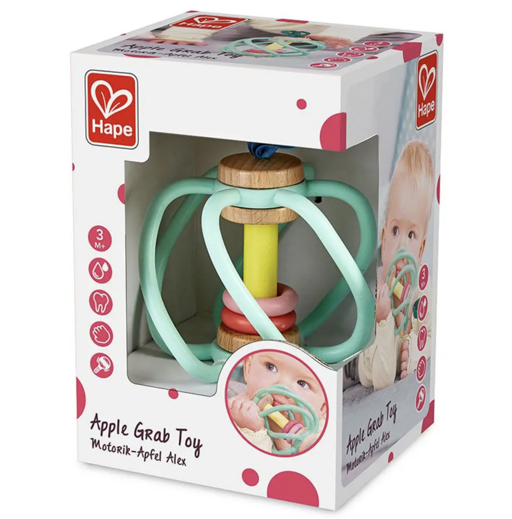 Apple Grab and Teether Toy packaged in an open sided box . 