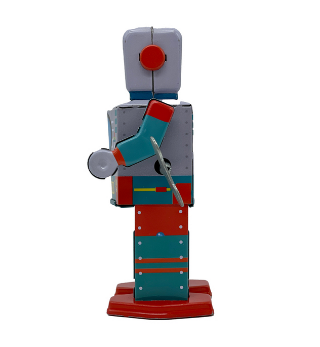 Side view of the Astronautbot showing the key that winds him up.  