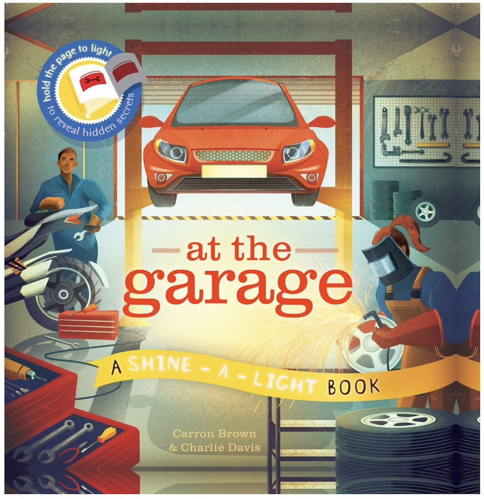 Illustrated cover of At the Garage, A Shine A Light book, featuring a garage with a car on a lift with tools hanging on the wall and in a toolbox. 