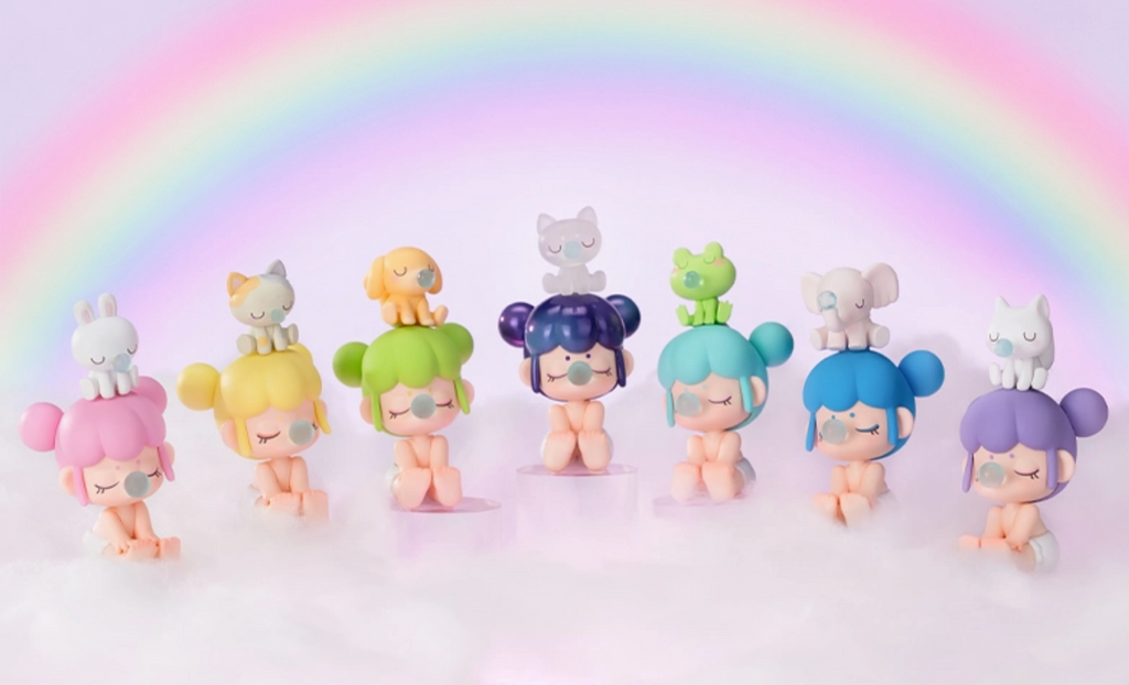 Each of the Baby Nanci figures with their cute little pets sitting on top of their heads. You never know which one you'll get until you open the box!