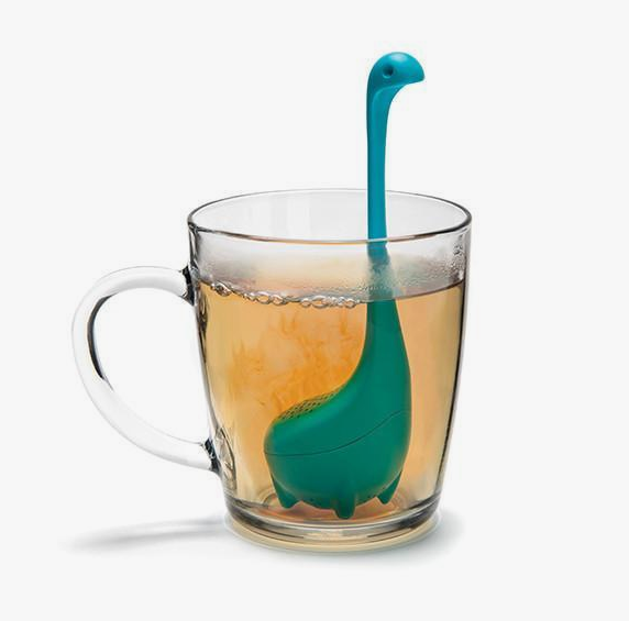 A pictue of the green baby Nessie tea iinfusion in a clear tea cup. 