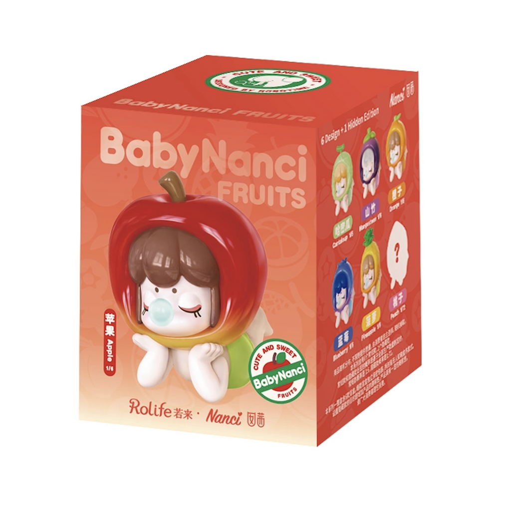 An orange box with a close up picture of Baby Nanci with a red apple hat on the front. The side of the box features each of the five possible figures in the series as well as a blank representing the secret Nanci figure. 