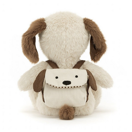 Backpack Puppy is an oatmeal colored pup and has a cocoa patch tummy, flopsy brown ears and a button nose. It's wearing a baclpack that looks a lot like them!