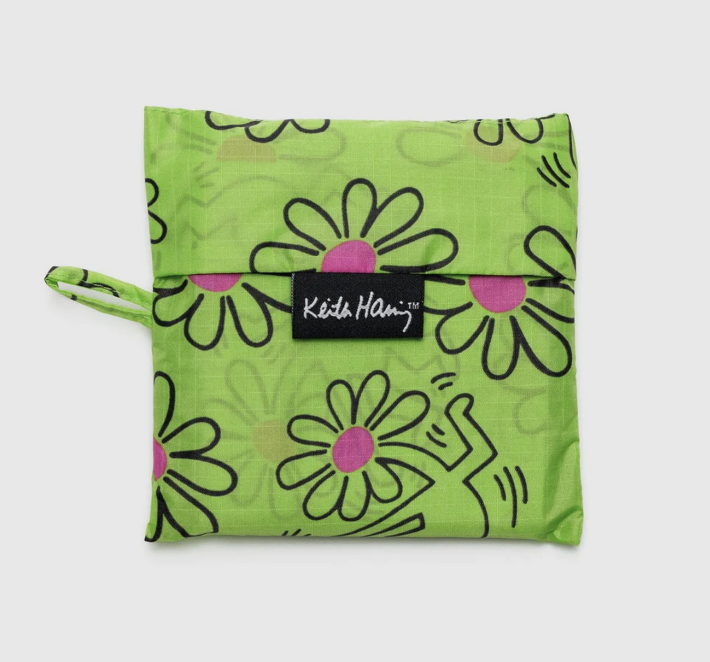 Keith Haring Flowers standard Baggu bag folded into it's matching pouch. 