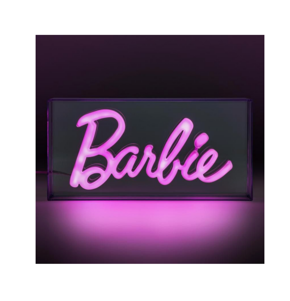 Barbie light lit up pink in a dark room.
