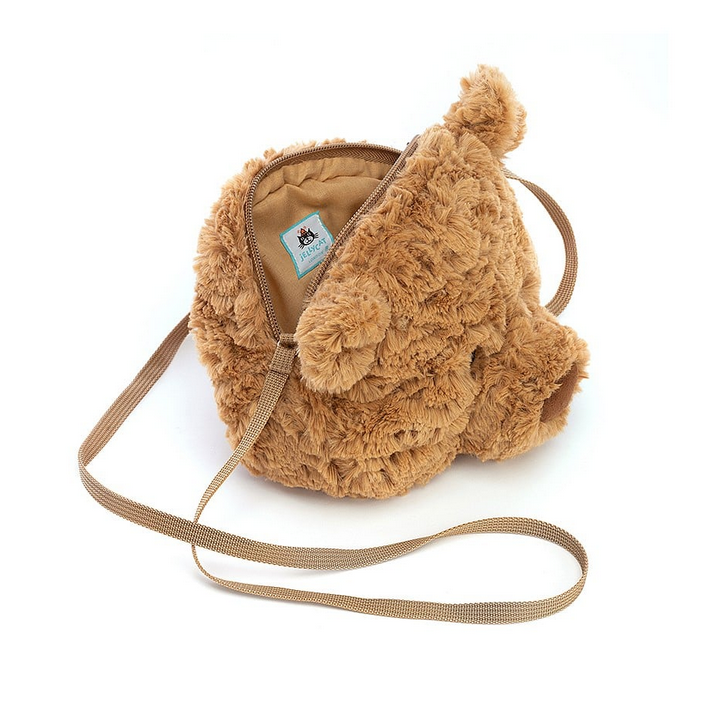 Top view of Bartholomew Bear bag with the zipper open to show inside of the bag. 