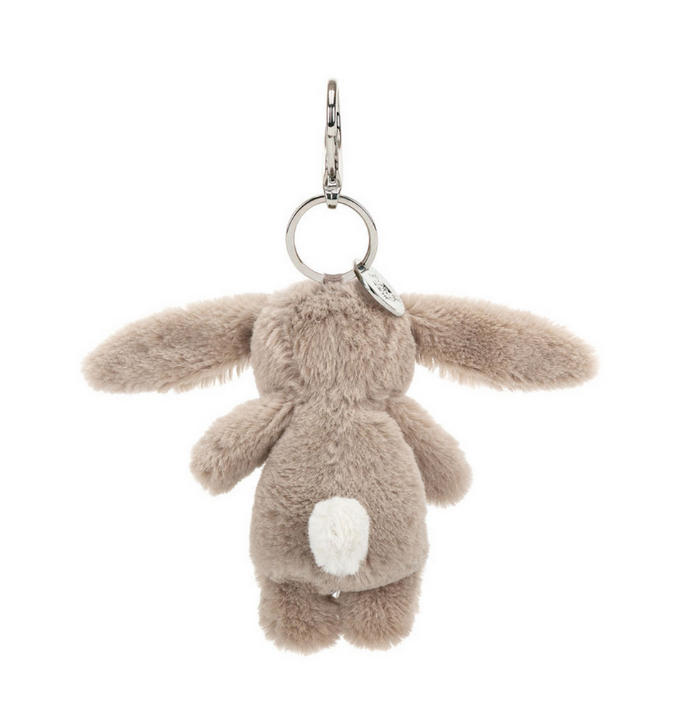 Plush Bashful Bunny Beige Bag Charm viewed from the back to show off it's cute cottontail. 
