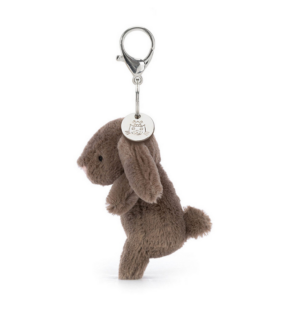 Bashful Truffle Bunny Bag Charm with silver lobster claw clasp and Jellycat disc viewed from the side 