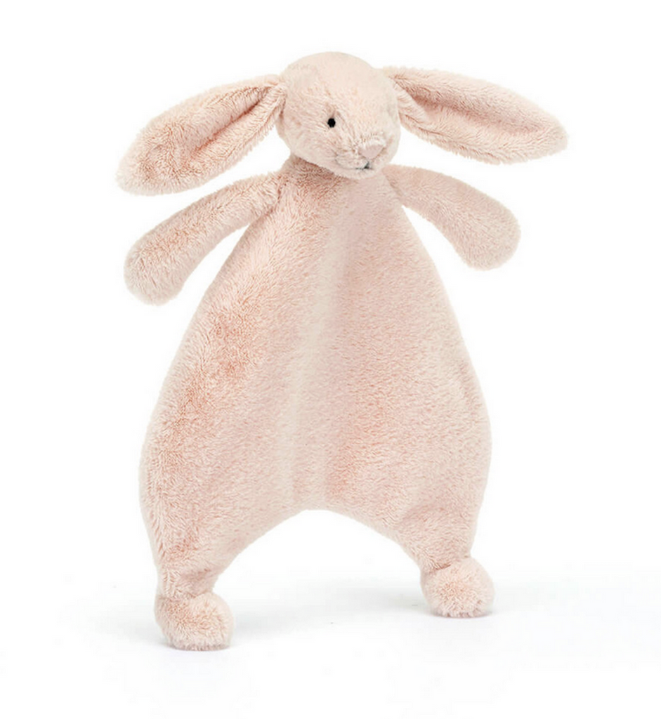 Pale pink Bashful Bunny plush comforter with no stuffing in the boody to be easily hugged. 