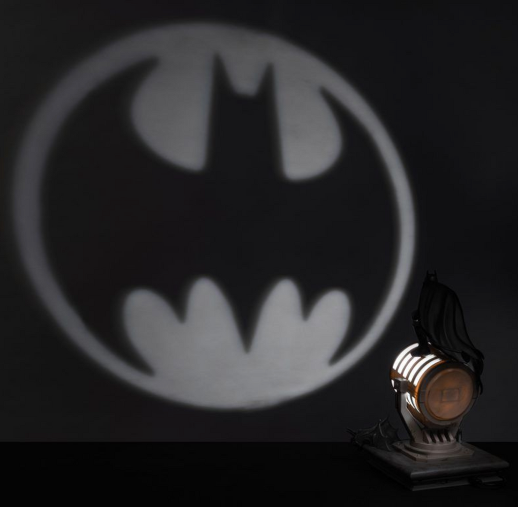 The bat signal projected on a wall. 