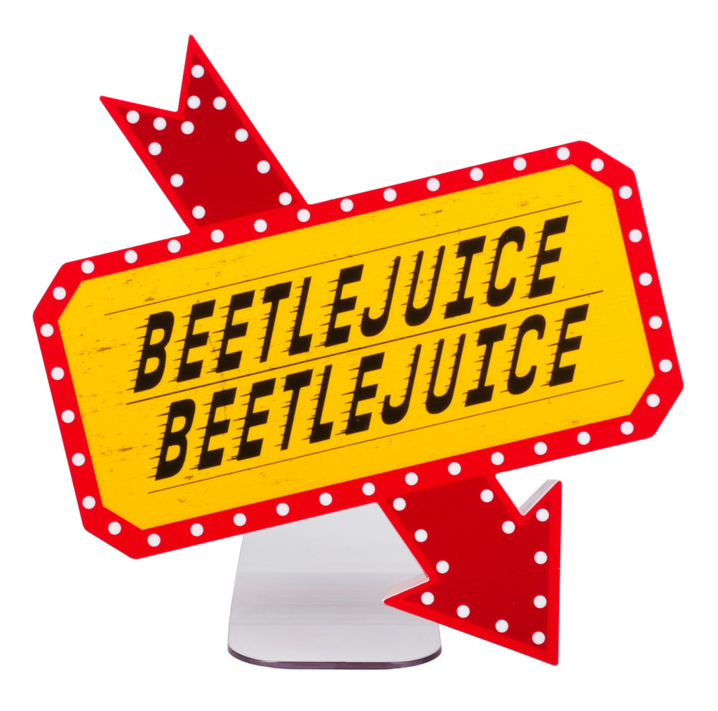 Yellow background with black lettering that reads "Beetlejuice Beetlejuice" with a red and white lit arrow pointing down. 