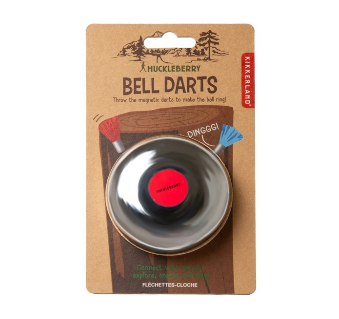 The bell used in the Bell Darts game attached to a cardboard hangcard, with illustrations of darts hitting the target. 