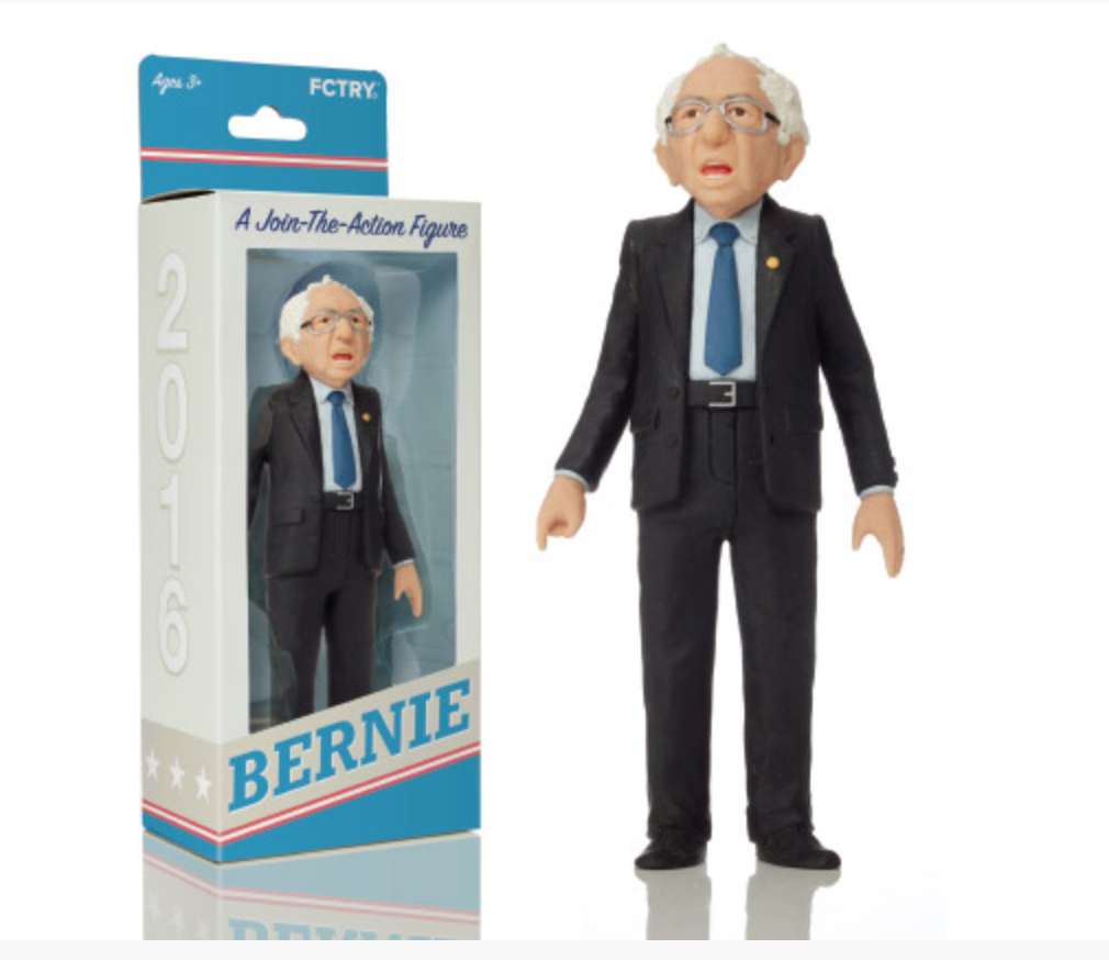 Bernie Sanders action figure in a box with a clear window. 