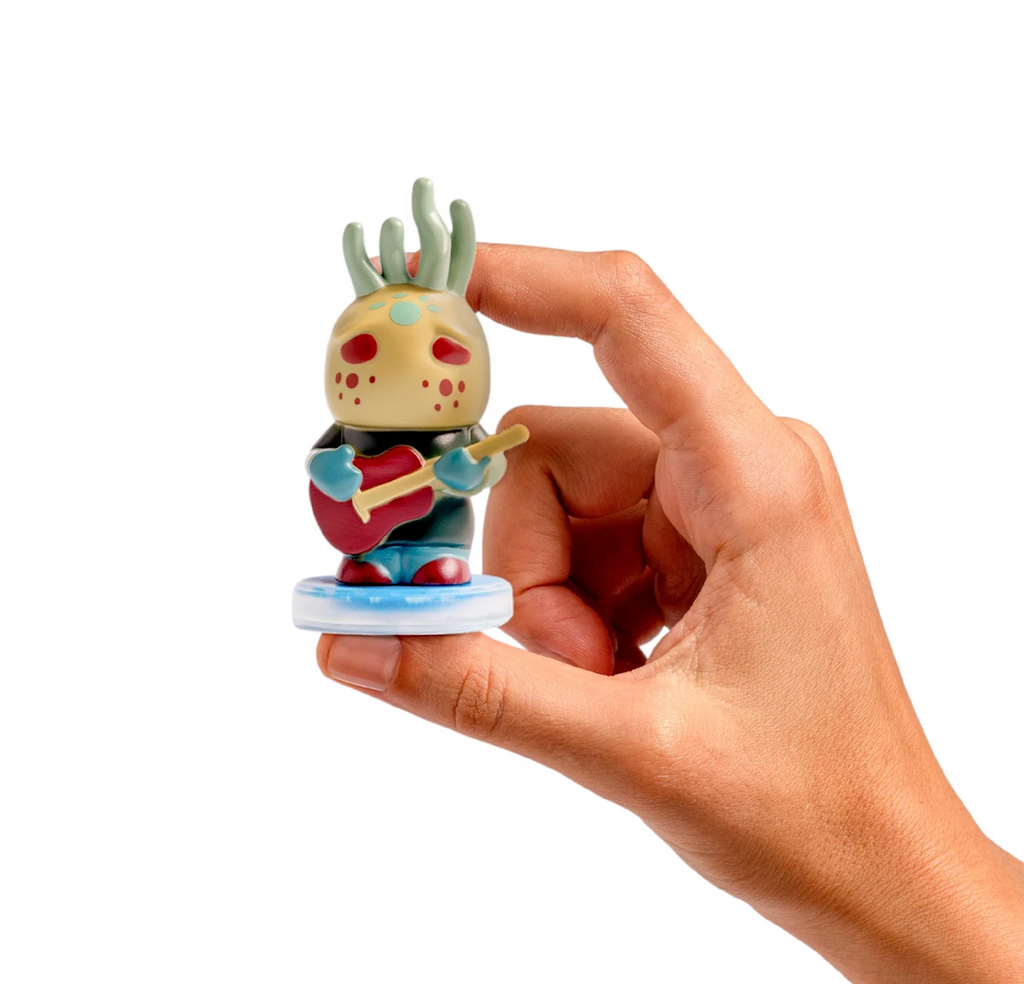 Loops Lab Mountain Riders band figure named Billie Five held in a hand. 