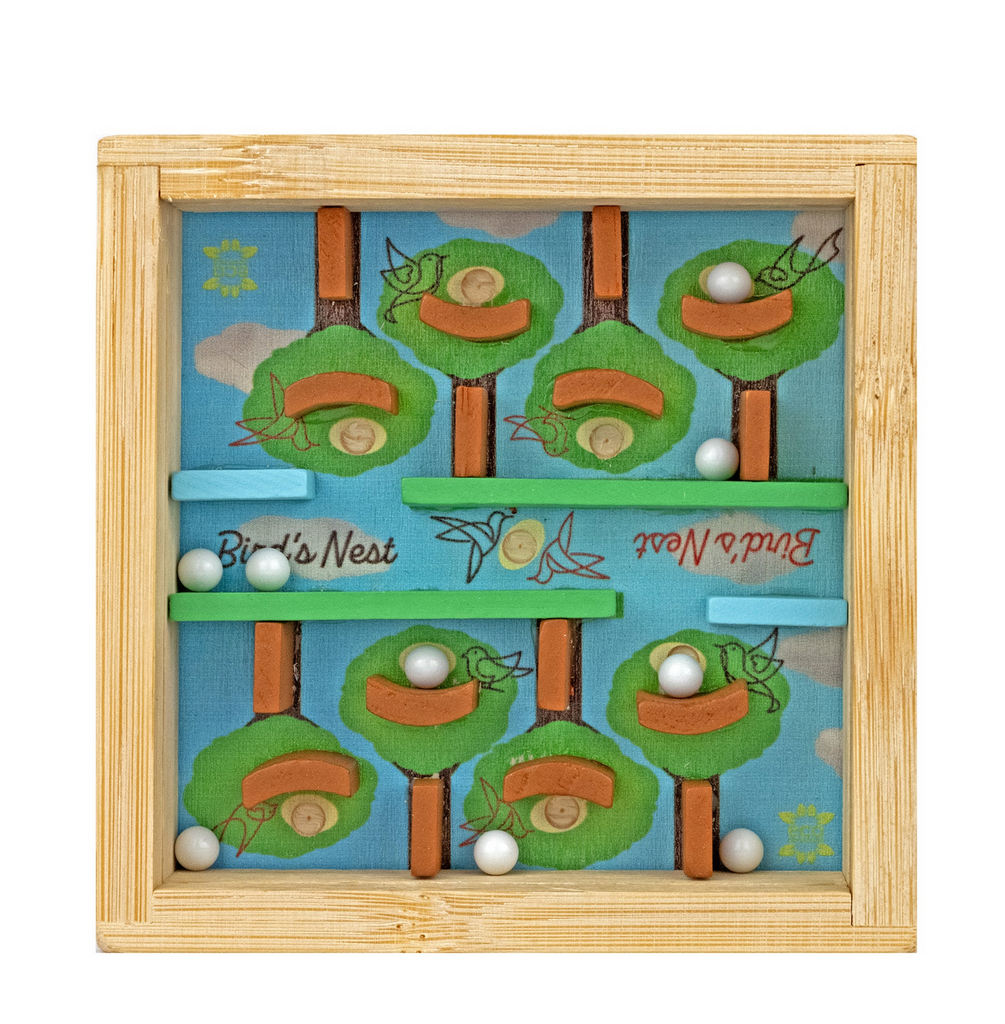 Birds Nest bamboo puzzle with blue and green images of nests in trees and white balls to be nestled into the nests to complete the puzzle. 