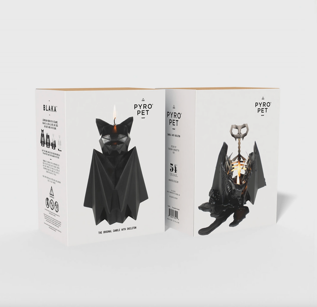Black bat-shaped candle with packaging displaying 'Pyro Pet' branding on a white background.