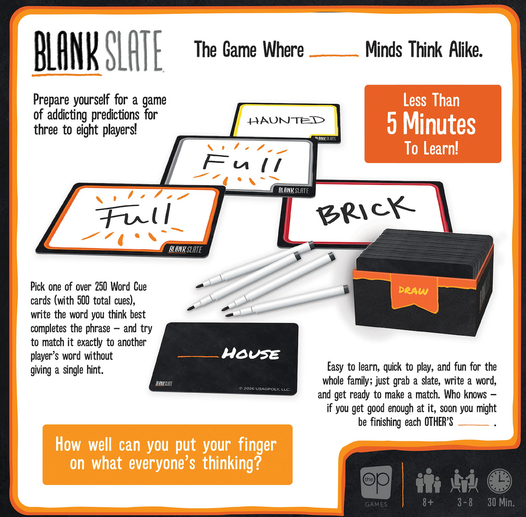 Blank Slate word game set. The set includes a black game box with orange writing, several blank slate cards, three white pens, and a small black cue card.