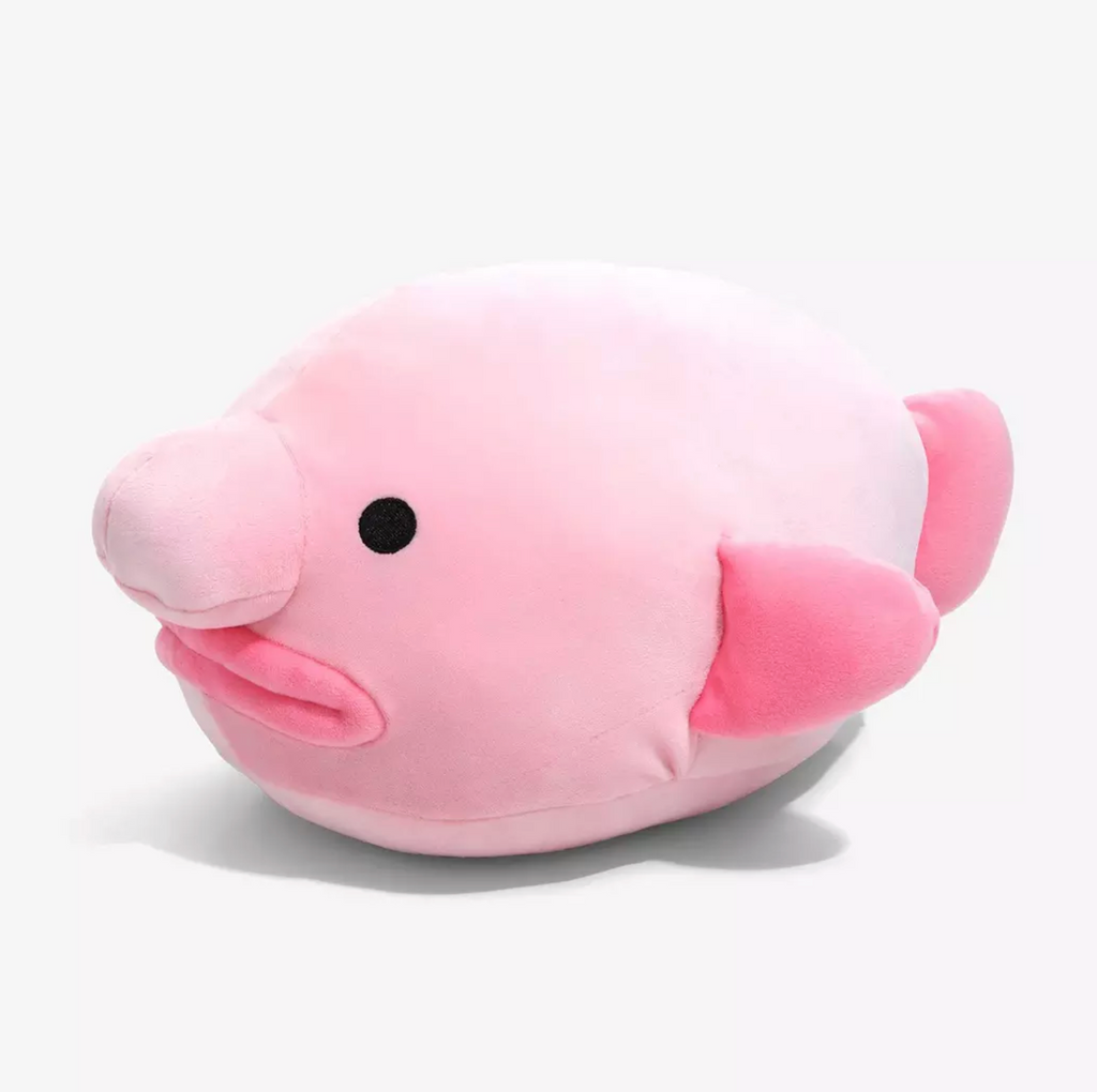 Plush Blob Fish Mochi plush from the side. 