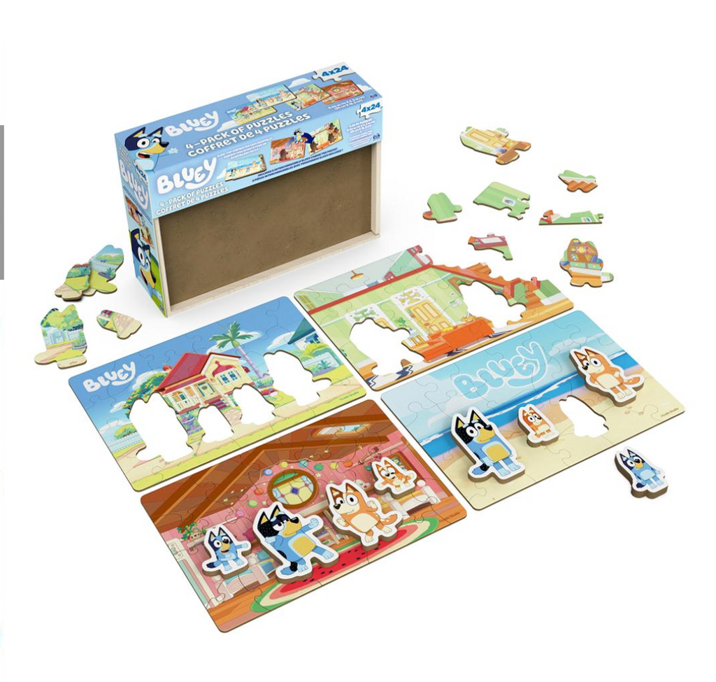 Open box with all 4 puzzles completed on a white background.