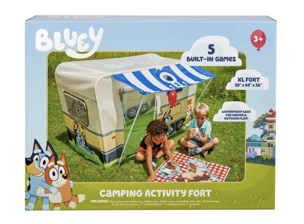 Box for the Bluey Camping Activity Fort with a picture of the fort set up outside with children having a picnic on the play mat. There is an illustration of Bluey and Bingo in the bottom corner of the box.  