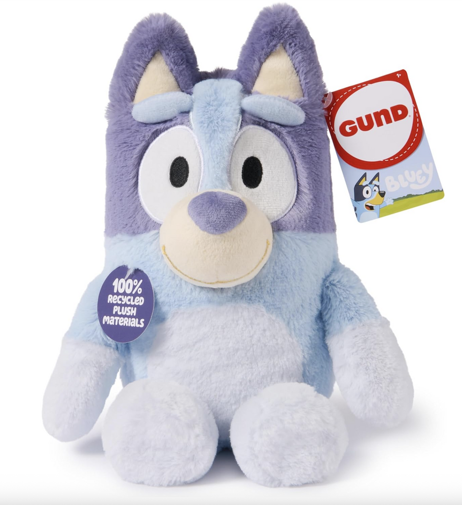 Bluey the Australian Blue Heeler stuffed animal in a sitting position with a tag the reads "Gund Bluey" and on that reads "100% Recycled Plush Materials" 
