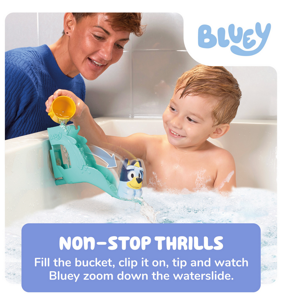 Child in bathtub playing with Bluey waterslide toy.
