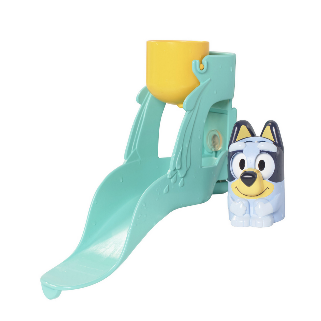 Blue dog figure next to a blue water slide bath toy on a white background.