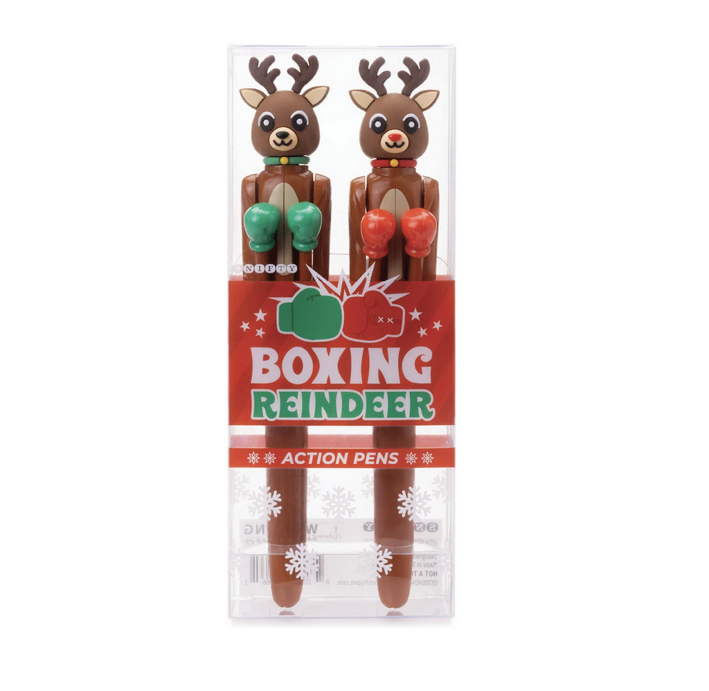 Set of 2 Boxing Reindeer pens packaged in a clear box. One reindeer is wearing green boxing gloves and the other is wearing red boxing gloves. 