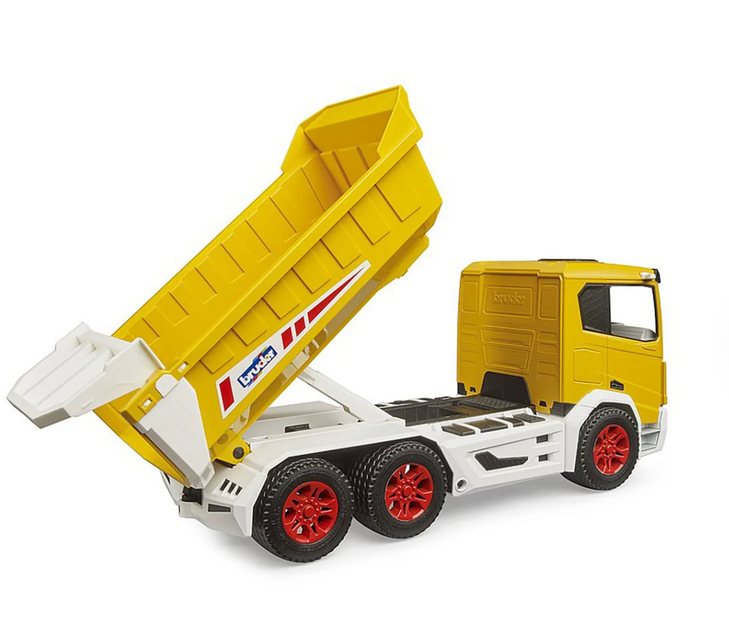 Toy tipper truck with yellow body and white chassis with the bed lifted to dump what it was hauling. 