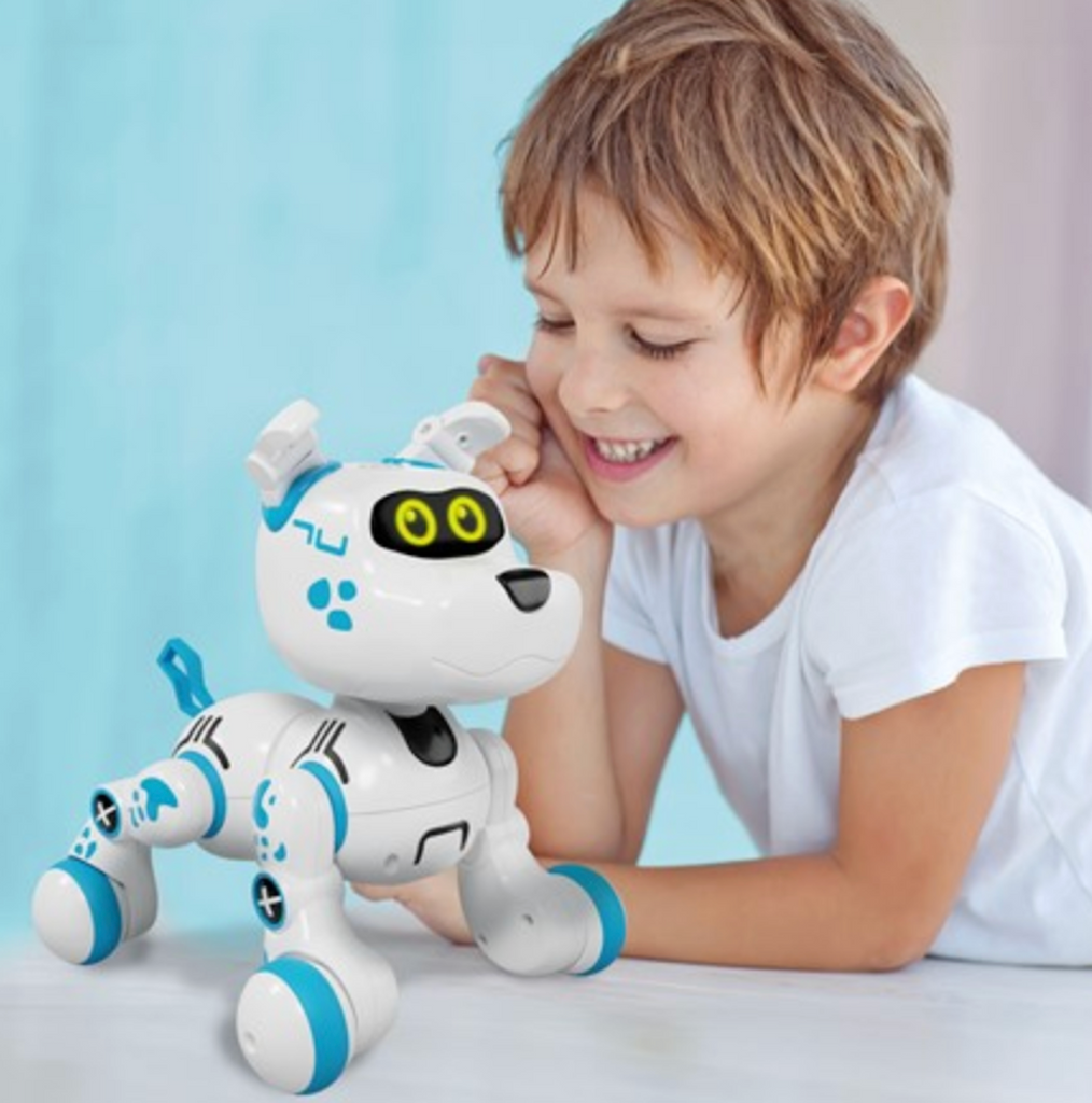 Buddy Bot on a table beside his human child who is controlling him. 