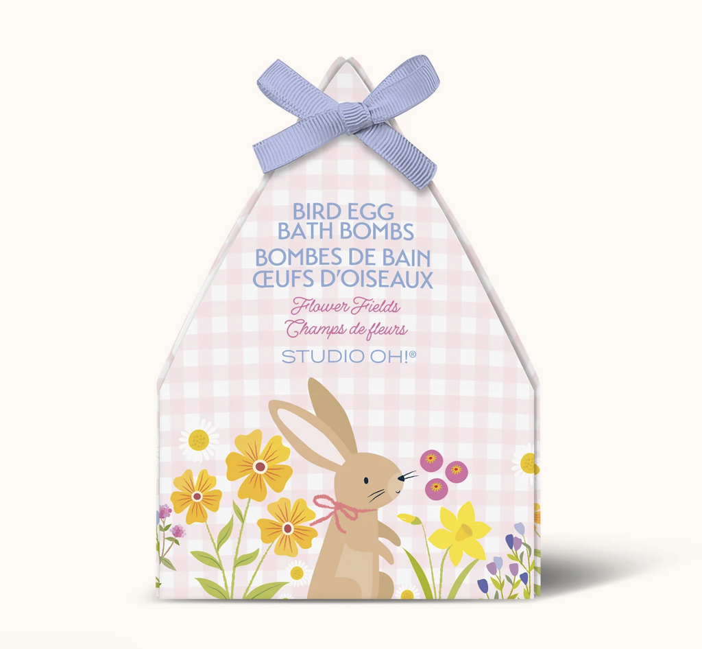 Adorable pink and white plaid box with a purple bow at the top with illustrations of a bunny in a field of flowers along the bottom. 