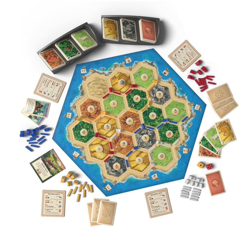 Hexagonal game board with various game pieces and cards set up for game play. 