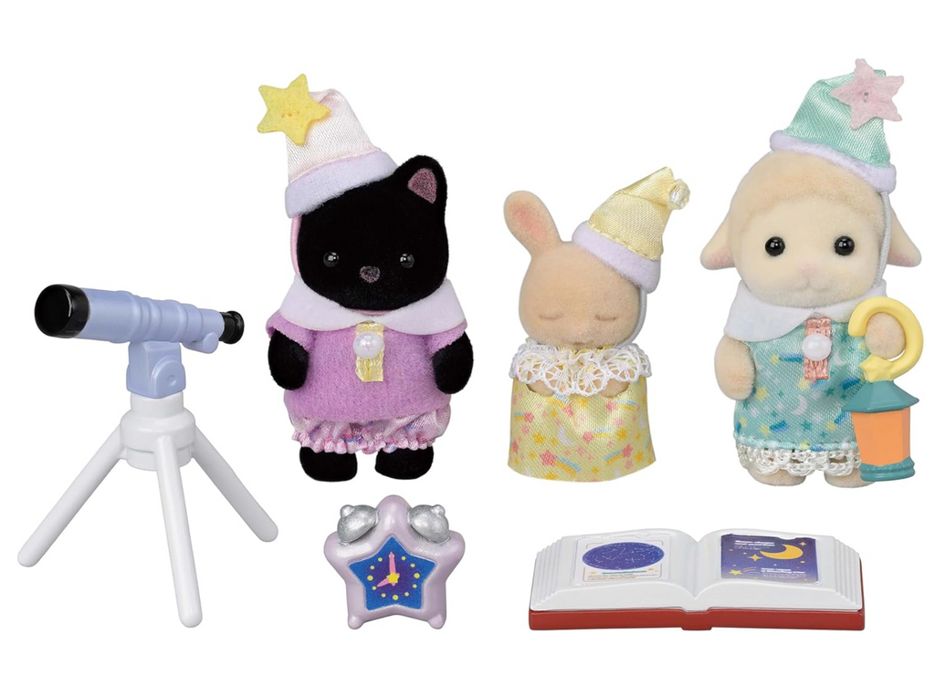 The three Calico Critters babies in pajamas with telescope, alarm clock and constellations book.